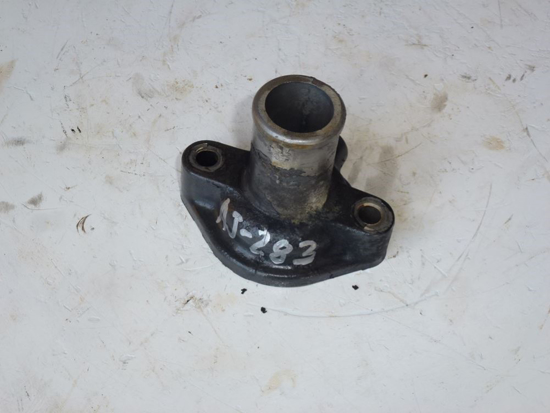 Picture of Thermostat Housing Cap Cover off 2001 Kubota V1505E V1505 Diesel Engine off Ransomes AR250 Mower