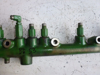 Picture of High Pressure Fuel Rail RE520928 off 2010 John Deere 6068HF485 RE522596