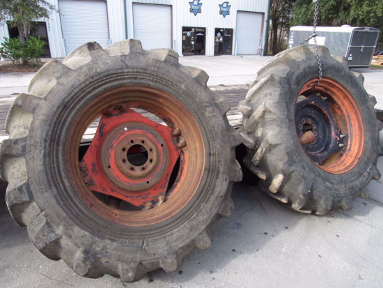 Picture of Pair of Primex 18.4-34 Logging Skidder Tractor Lug Bar Tires on Kubota M108S Rims Wheels