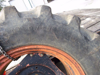 Picture of Pair of Primex 18.4-34 Logging Skidder Tractor Lug Bar Tires on Kubota M108S Rims Wheels