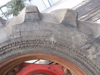 Picture of Pair of Primex 18.4-34 Logging Skidder Tractor Lug Bar Tires on Kubota M108S Rims Wheels