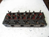 Picture of Kubota Cylinder Head w/ Valves V1505-E Engine Jacobsen 2810881