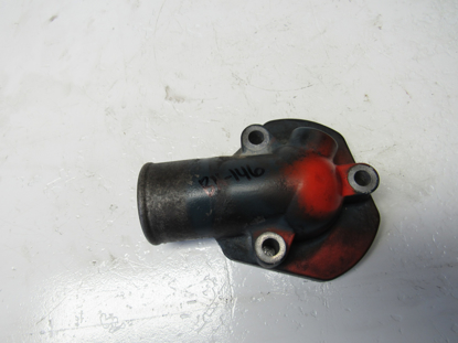 Picture of Kubota 1E484-73260 Thermostat Cover Water Flange off V3800-CR-TI-EV13 1G565-73260