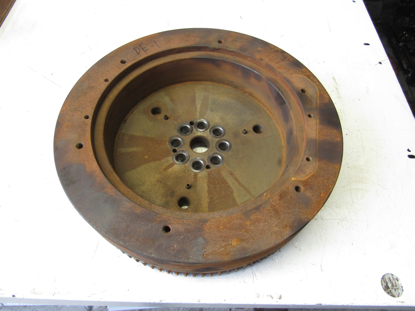 Picture of Kubota 1J755-25014 Flywheel w/ Ring Gear to certain V3307 engine 1J755-25012 1J755-25010 1G777-63820 1G777-63821