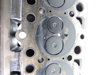 Picture of Kubota 1J800-03040 Cylinder Head to certain V2403-CR engine