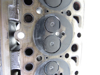 Picture of Kubota 1J800-03040 Cylinder Head to certain V2403-CR engine