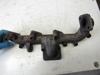 Picture of Kubota 1J811-12312 Exhaust Manifold to certain V2403-CR engine 1J811-12313 Cat Caterpillar 490-5930 C2.4