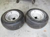 Picture of 2 Carlisle 20x10.00-10 Smooth Tires on 4 bolt Rims Wheels Jacobsen G-Plex III